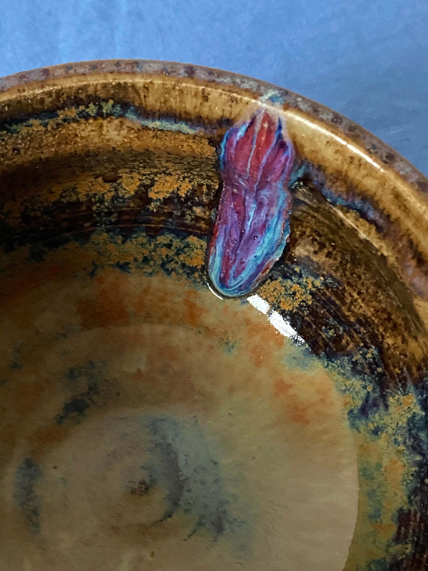 Black two handled bowl violet drips