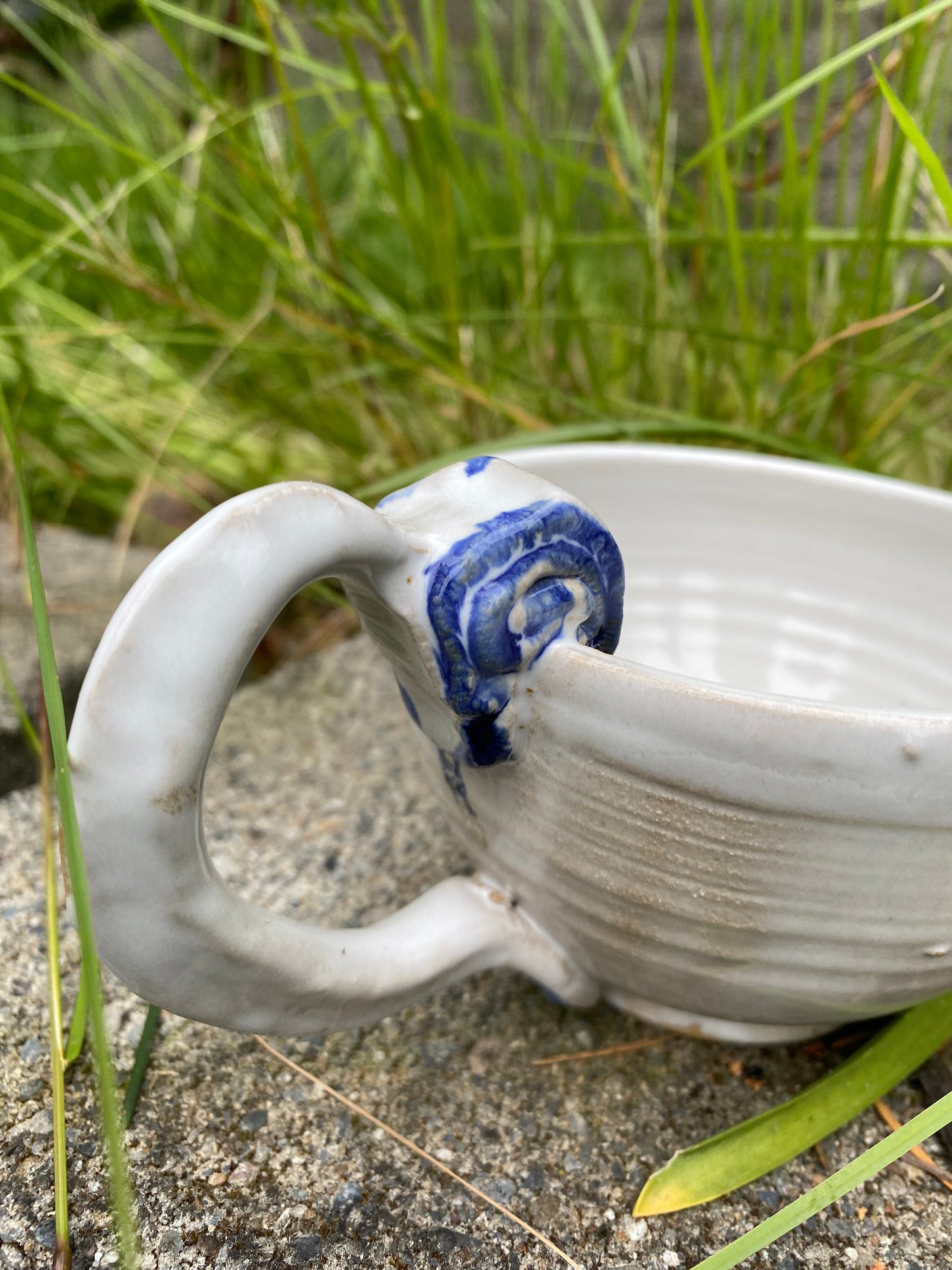 Cappuccino cup with blue swirl