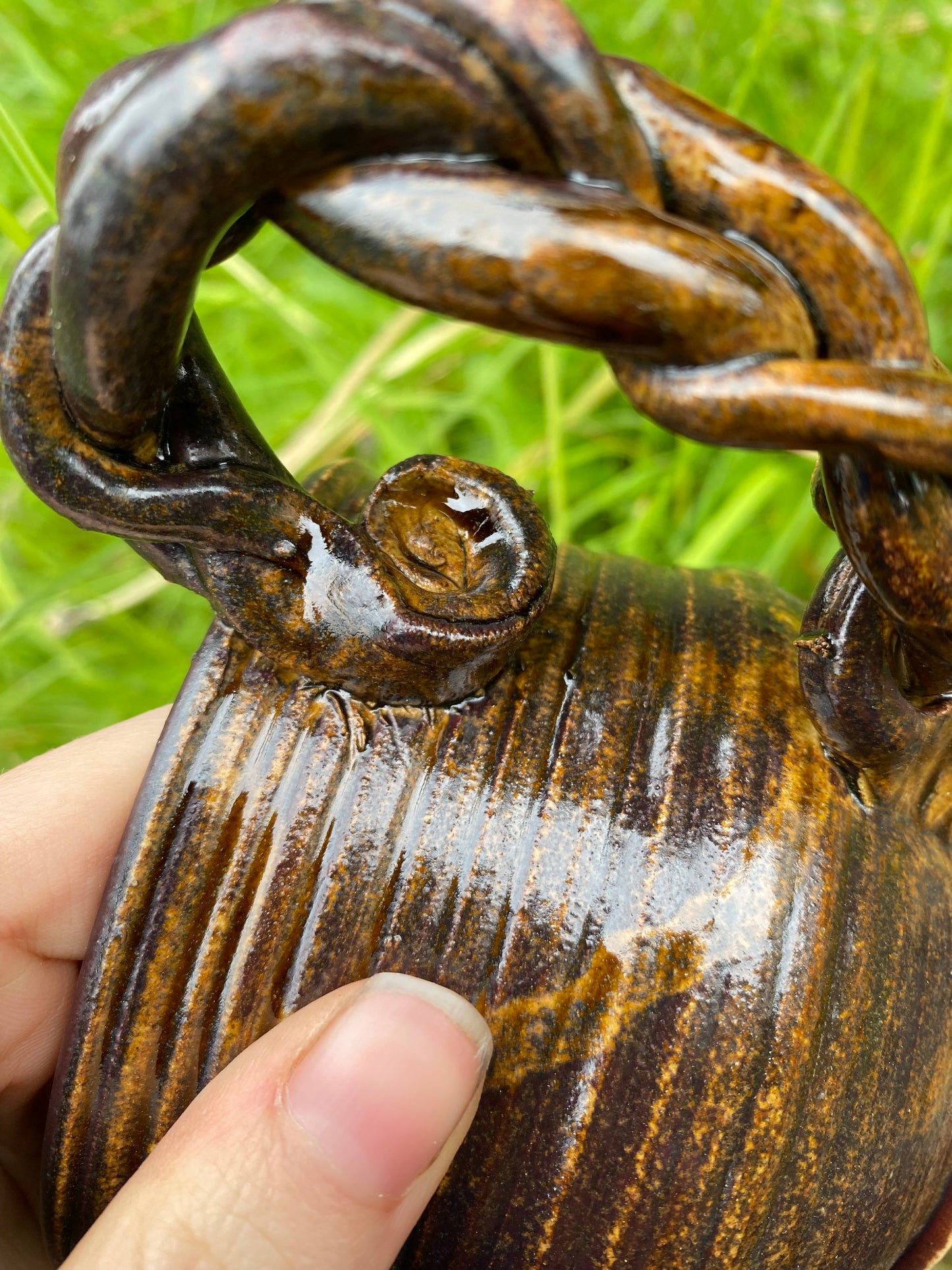 Terracotta espresso cup with swirly handle