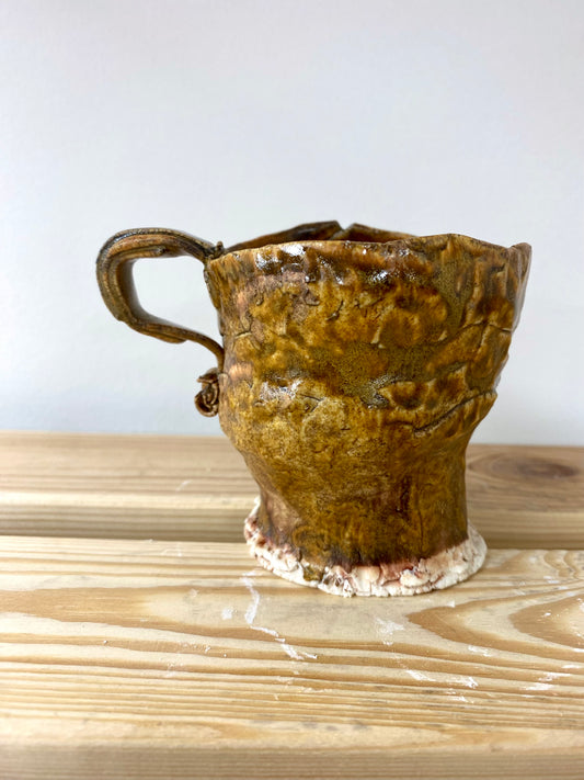 Small green amber porcelain cup