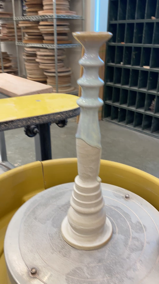 White and opalescent candlestick
